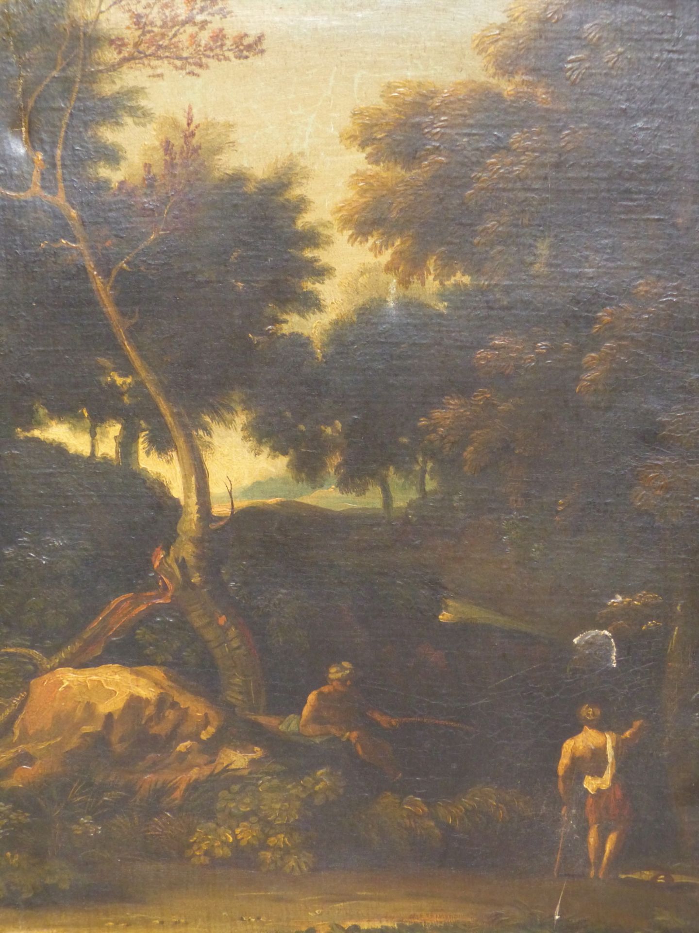 17TH /18TH CENTURY OLD MASTER SCHOOL. TWO FIGURES BY A WOODLAND STREAM. OIL ON CANVAS. THE GILT