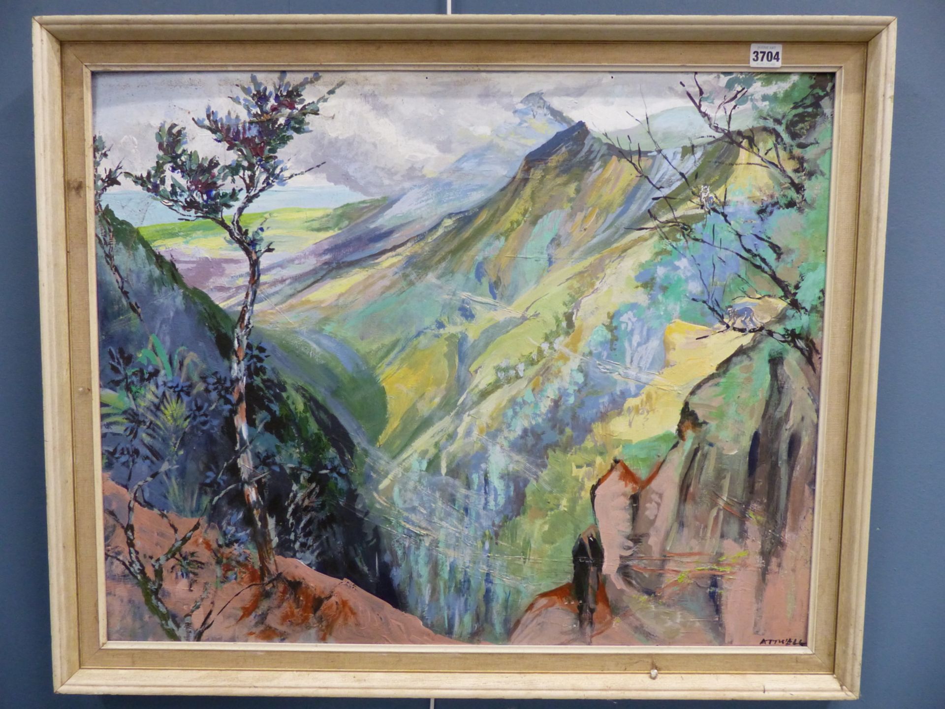 IVY T. ATTWELL (1895-1985) A MOUNTIANOUS VALLEY. OIL ON BOARD. SIGNED L/R. 74 X 59 cm.