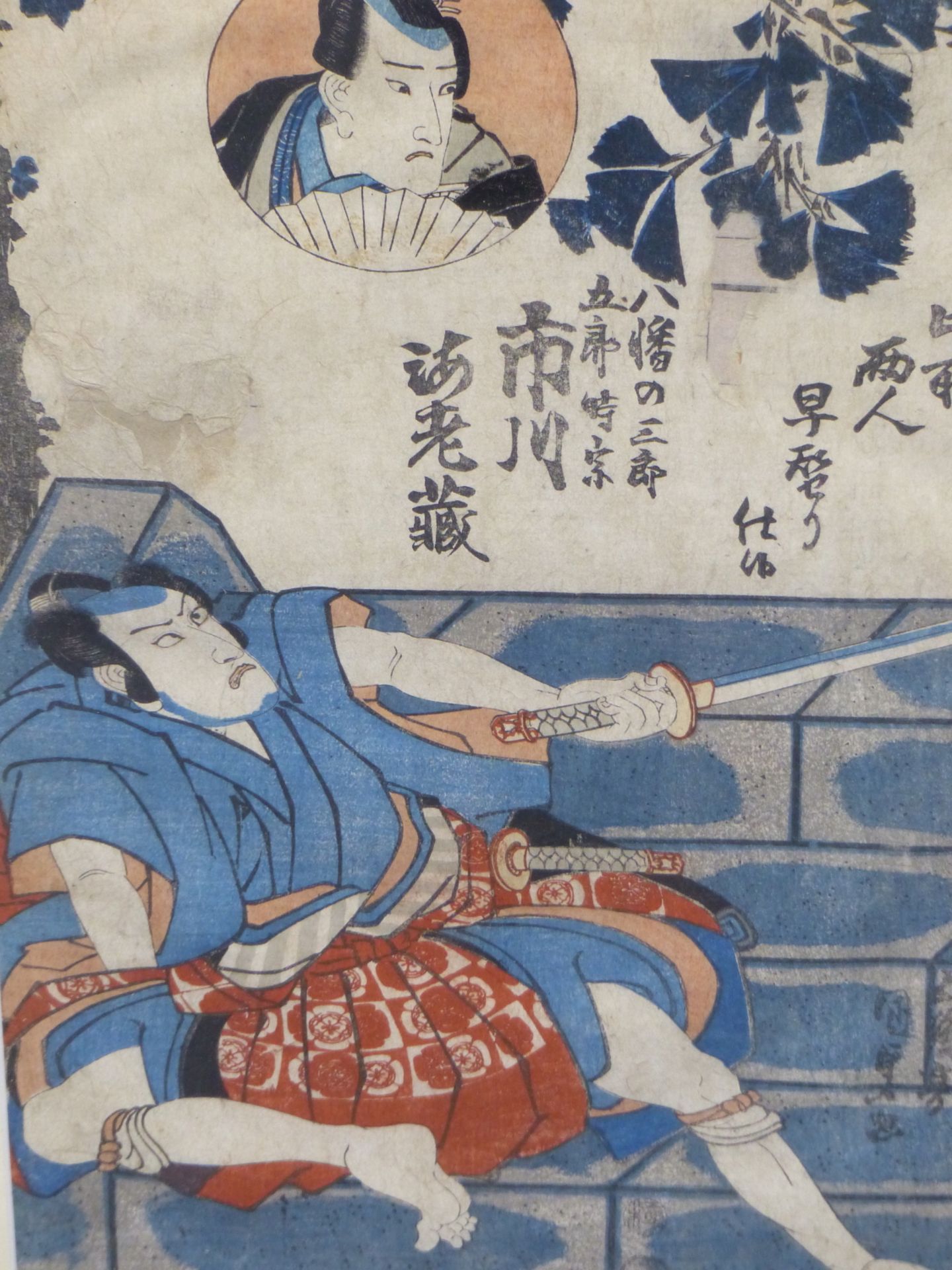 UTAGAWA SADATORA (JAPANESE EARLY 19TH CENTURY) A WOODBLOCK PRINT OF A SEATED WARRIOR. 23 X 33 cm.