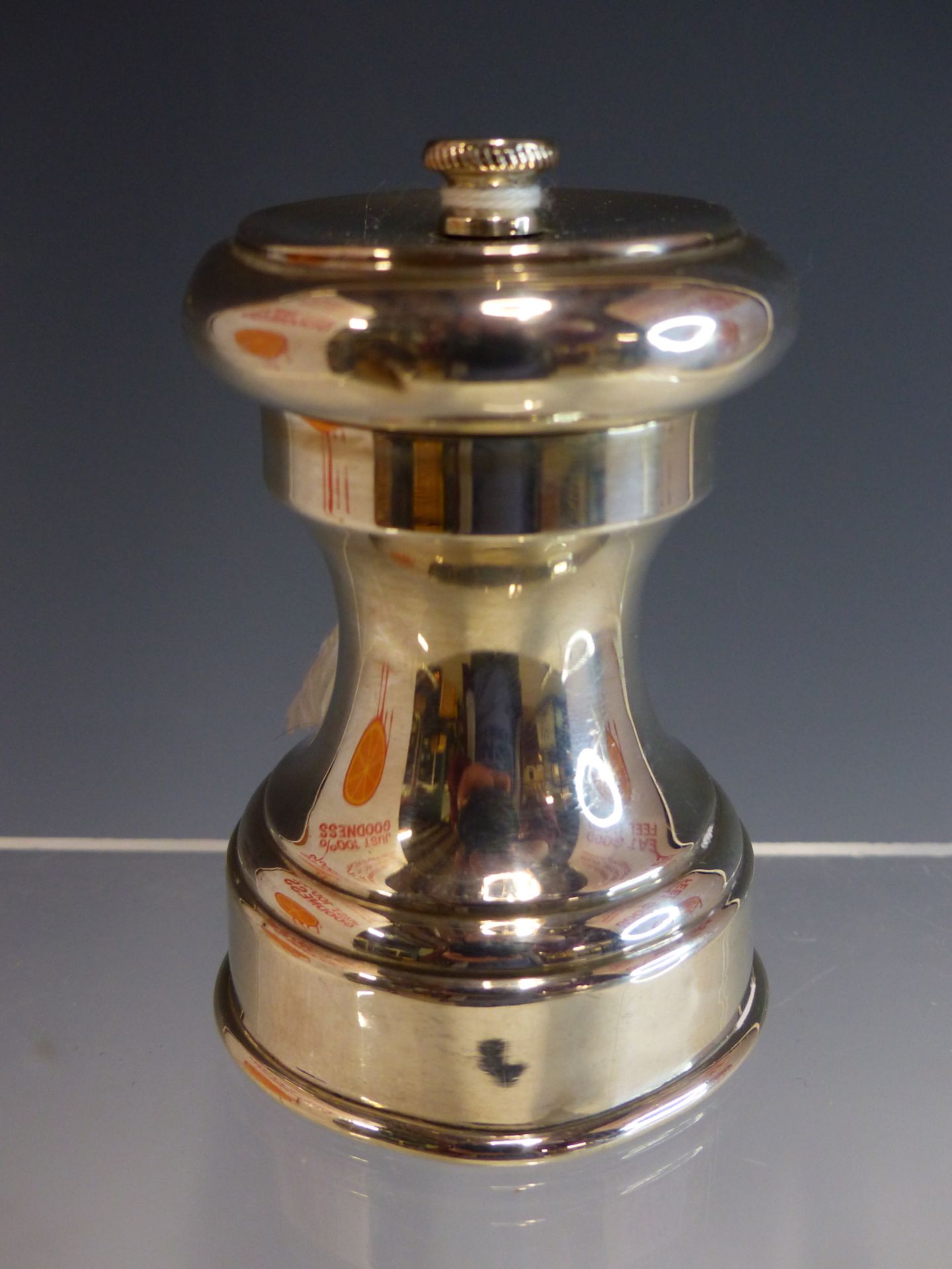 A HALLMARKED SILVER PEPPER MILL WITH CHESTER MARKS.