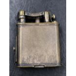 A VINTAGE DUNHILL SILVER PLATED LIGHTER WITH UNUSUAL PROJECTING WICK FEATURE.