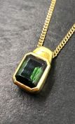 H.STERN. A GREEN TOURMALINE PENDANT, WITH SIGNATURE STAMP FOR H.STERN, ADDITIONAL 750 MARK, ASSESS