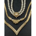 THREE VINTAGE CHRISTIAN DIOR NECKLACES. THE GOLD PLATED EXAMPLES LENGTH 41cms AND 47cms EACH, THE