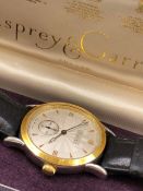 AN ASPREY TEMPUS FUGIT STAINLESS STEEL AND GOLD PLATED MANUAL WOUND WRIST WATCH COMPLETE WITH