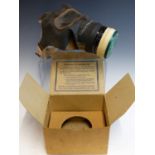 A WORLD WAR II PERIOD GAS MASK IN ORIGINAL CARD BOX, TOGETHER WITH A MILITARY TYPE HINGED LID BOX.