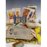 A QUANTITY OF CIGARETTE AND TEA CARDS, SOME LOOSE AND OTHERS IN ALBUMS, TOGETHER WITH VARIOUS