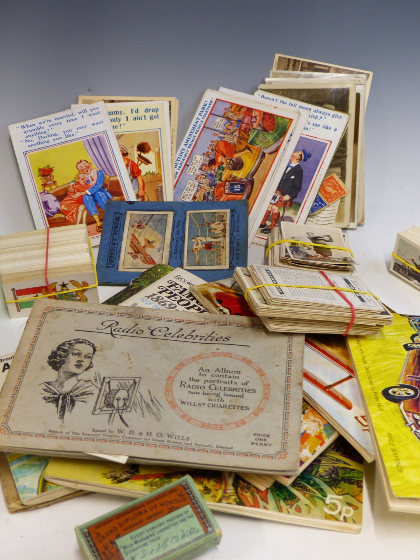 A QUANTITY OF CIGARETTE AND TEA CARDS, SOME LOOSE AND OTHERS IN ALBUMS, TOGETHER WITH VARIOUS