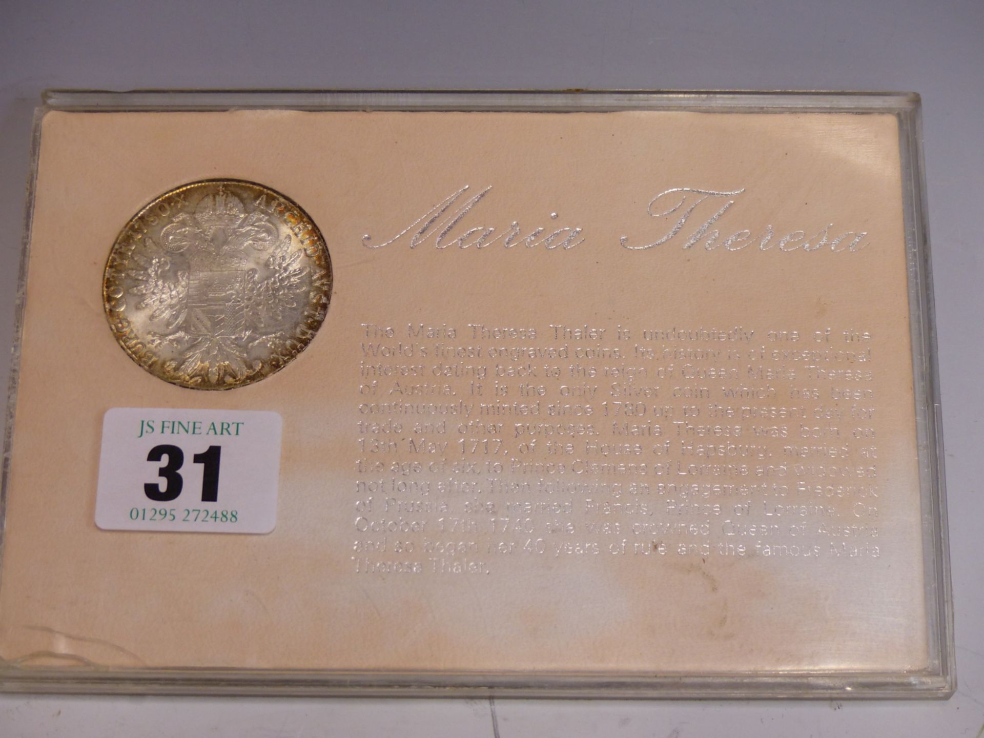 A MARIA THERESA THALER COIN IN PRESENTATION PACK.