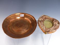 AN ARTS AND CRAFTS BEATEN COPPER SMALL PHOTO FRAME TOGETHER WITH A DECORATED COPPER SHALLOW BOWL.(