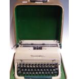 A VINATGE 1950'S REMINGTON TYPE WRITER.