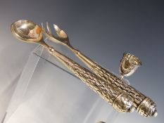 A PAIR OF EASTERN WHITE METAL SALAD SERVERS, EACH HANDLE INSET WITH LUSTRE CABUCHON. TOGETHER WITH A