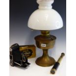 A VINTAGE BRASS PARAFFIN LAMP WITH WHITE GLASS SHADE, A KODAK JUNIOR CAMERA IN ORIGINAL BOX, AND A