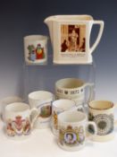 A VINTAGE WADE, BELL WHISKY JUG WITH "AFORE YE GO" LOGO TOGETHER WITH FIVE COMEMMORATIVE MUGS, A