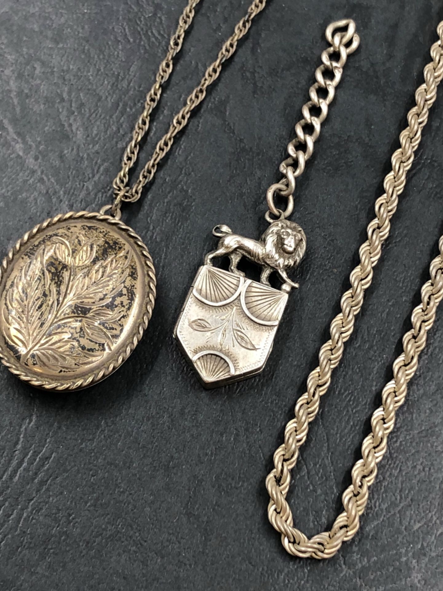 A HALLMARKED SILVER LOCKET AND CHAIN, A 925 STAMPED ROPE NECKLACE, AND A SMITH & GAMBLE VICTORIAN