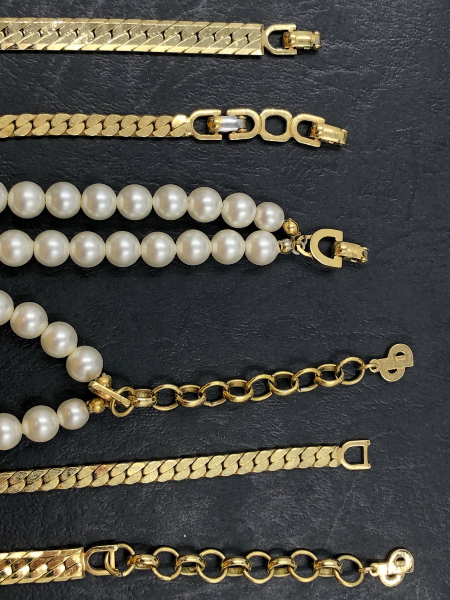 THREE VINTAGE CHRISTIAN DIOR NECKLACES. THE GOLD PLATED EXAMPLES LENGTH 41cms AND 47cms EACH, THE - Image 3 of 3