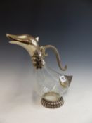 A VINTAGE SILEA SILVER PLATE MOUNTED GLASS DUCK FORM CLARET JUG.