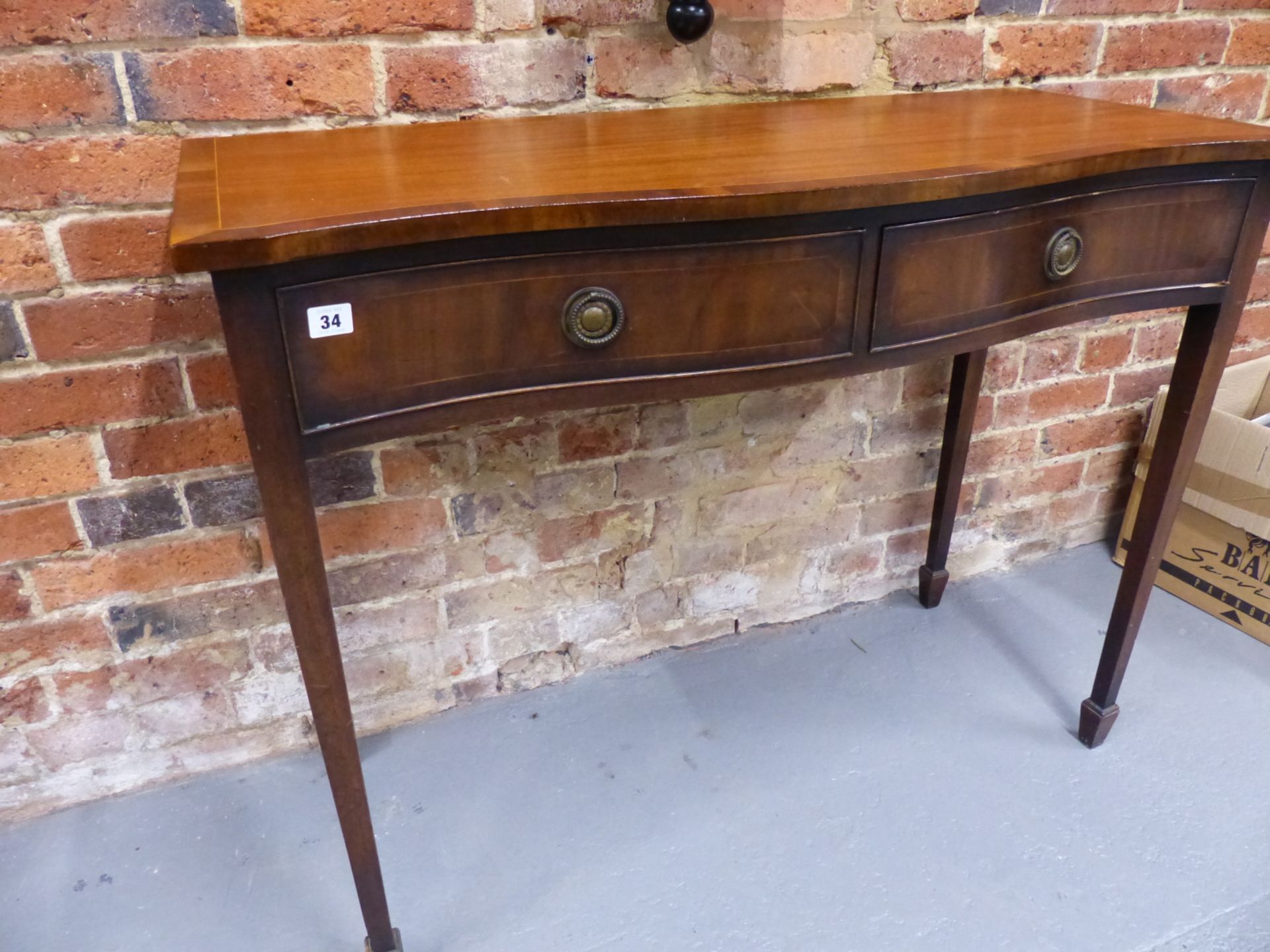 G.T RACKSTRAW , A GEORGE III STYLE MAHOGANY SERPENTINE FRONT SERVING SIDE TABLE WITH TWO DRAWERS. - Image 3 of 4
