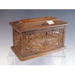 A VICTORIAN CARVED OAK MONEY CASKET, CARVED FROM BEAMS OF HMS FOUDROYANT.