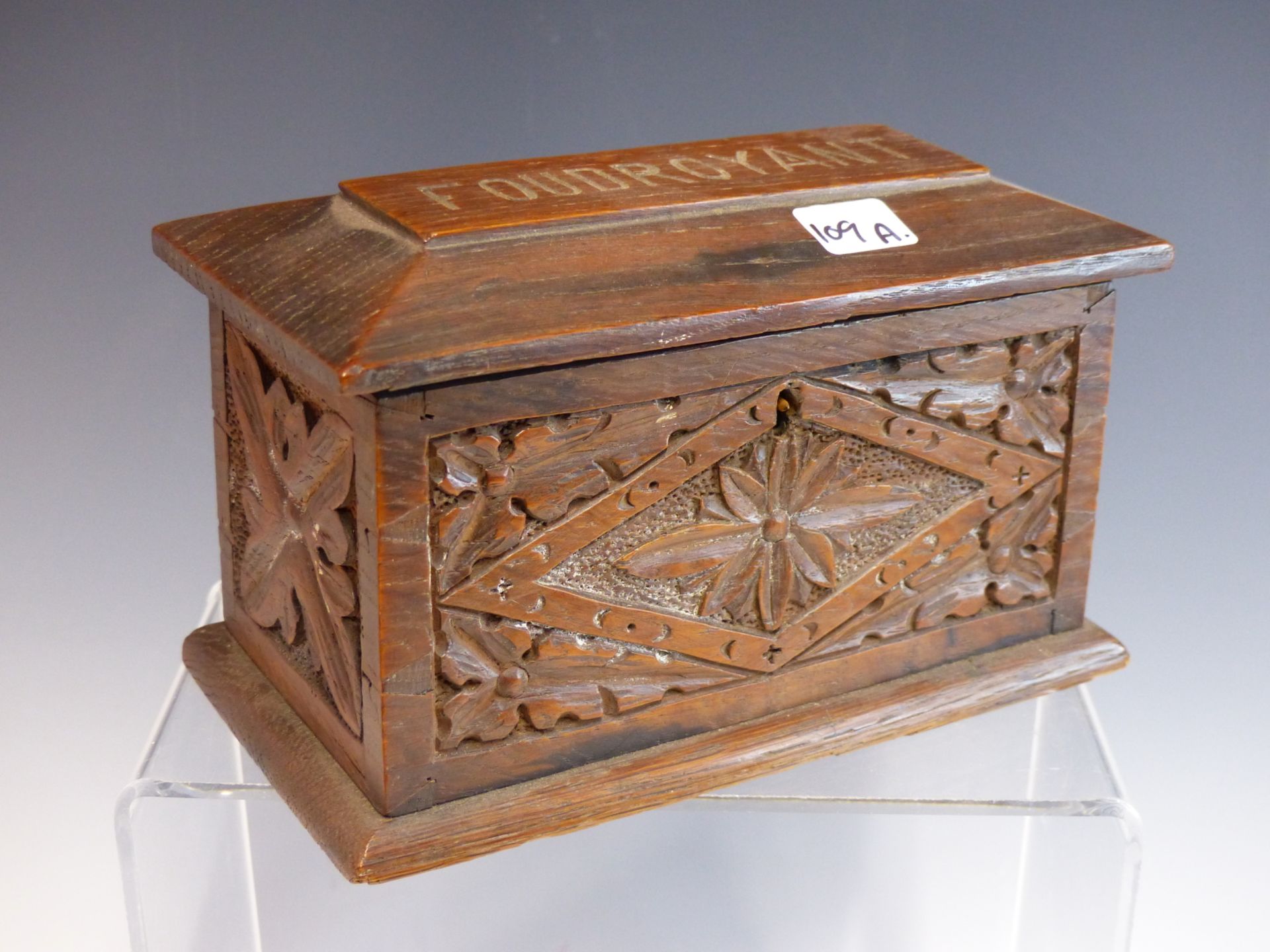 A VICTORIAN CARVED OAK MONEY CASKET, CARVED FROM BEAMS OF HMS FOUDROYANT.