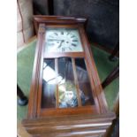 A WALNUT CASED WALL CLOCK