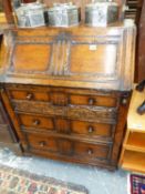 A BESPOKE OAK BUREAU