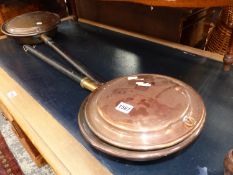 TWO VICTORIAN COPPER WARMING PANS.