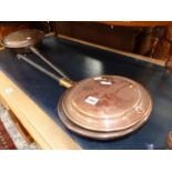 TWO VICTORIAN COPPER WARMING PANS.