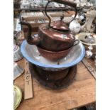 A COPPER KETTLE, COLLANDER AND OVAL DISH TOGETHER WITH A BOWL FROM A WASHING SET.