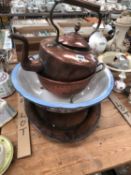 A COPPER KETTLE, COLLANDER AND OVAL DISH TOGETHER WITH A BOWL FROM A WASHING SET.