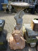 A POTTERY BUST OF A LADY TOGETHER WITH A COMPOSITE BIRD BATH.