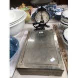 A KITCHEN SCALES, A CLOTHES IRON TOGETHER WITH A VELVET LINED TIN BOX