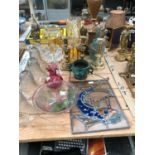 A GLASS AND A WOODEN TABLE LAMP, GLASS WARES, BRASS CANDLESTICKS, A LEADED GLASS PANEL, ETC.