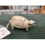 A VINTAGE HAND CRAFTED WOODEN PIG, OPENING COMPARTMENT WITH TWO MINIATURE PIGLETS INSIDE. BELIEVED