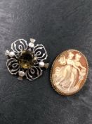 A HALLMARKED 9ct GOLD CAMEO BROOCH IN A ROPE EDGE FRAME TOGETHER WITH SCOTTISH THISTLE STONE SET