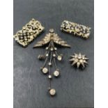 TWO SILVER GILT ANTIQUE STYLE BROOCHES, AN ANTIQUE STAR BURST PASTE BROOCH, AND A CONTINENTAL SILVER