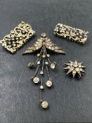 TWO SILVER GILT ANTIQUE STYLE BROOCHES, AN ANTIQUE STAR BURST PASTE BROOCH, AND A CONTINENTAL SILVER