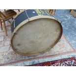 A BIG BASE DRUM INSCRIBED TOBY GOSS MORRIS, WITH A FOOT PEDAL DRUMSTICK. Dia. 78cms.