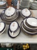 A WORCESTER PART DINNER SERVICE WITH BLUE RIMS BANDS
