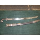 A GOOD QUALITY INDIAN SWORD WITH SILVER HILT AND SCABBARD MOUNTS