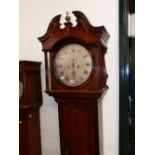 A GEORGIAN OAK 8 DAY LONG CASE CLOCK WITH ROUND SILVERED DIAL.