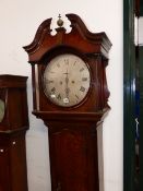 A GEORGIAN OAK 8 DAY LONG CASE CLOCK WITH ROUND SILVERED DIAL.