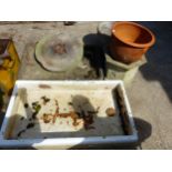 A LARGE ENAMEL BASIN, A STONE BASIN, THREE PLANTERS ETC.