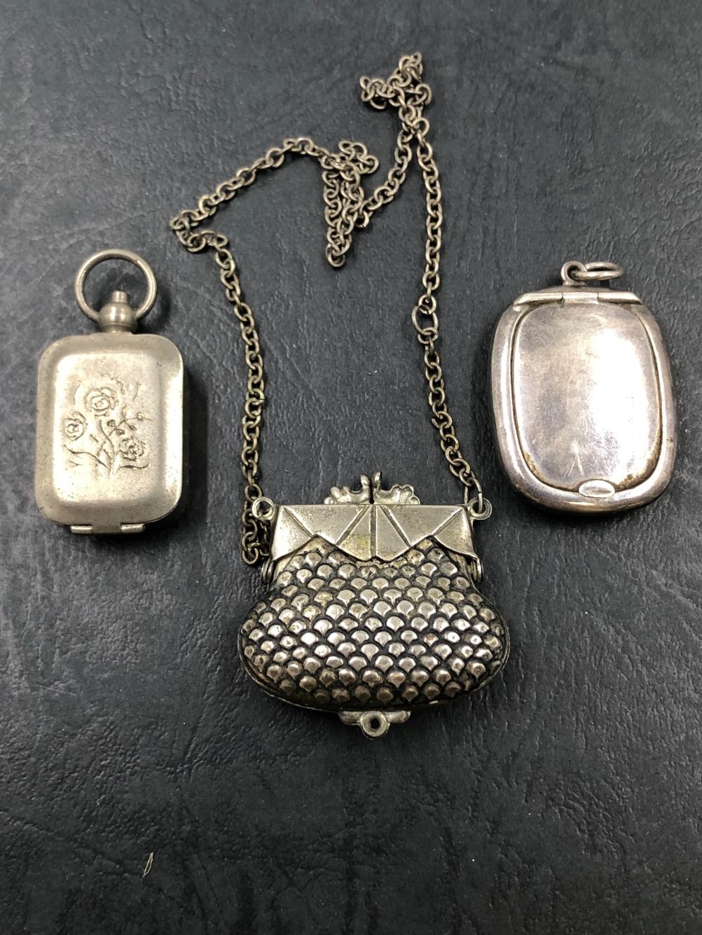 A HALLMARKED SILVER SNUFF BOX WITH SUSPENSION RING, A NICKEL PURSE WITH CHAIN, AND A NICKEL MONOGRAM
