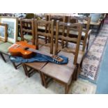 A SET OF SIX WALNUT LADDER BACK SIDE CHAIRS