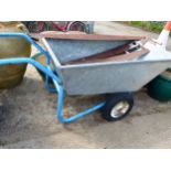 A LARGE WHEEL BARROW.