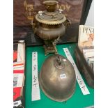 A BRASS SAMOVAR TOGETHER WITH AN ELECTROPLATE MEAT DISH COVER AND A WARMING PAN.