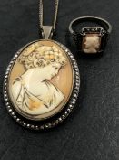 A VINTAGE PORTRAIT CAMEO BROOCH / PENDANT WITH A MARCASITE SET FRAME, STAMPED STERLING ASSESSED AS