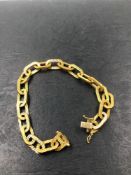 A VINTAGE PAPERCLIP LINK BRACELET WITH A BARKED FINISH. THE BRACELET STAMPED 750, AND WITH A