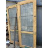 A PAIR OF ART DECO GLAZED INTERIOR DOORS.