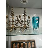 A PAIR OF BRASS NEOGOTHIC TWO LIGHT CANDELABRA TOGTHER WITH A WATERFORD BLUE GLASS VASE